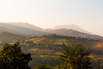 Green Italian hills early summer morning.