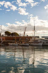 Sailboat in the old port of Barcelona on a sunny morning