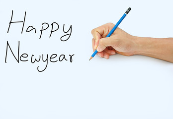 Hand holding a pencil on a white paper background, writing with pencil for word " Happy New Year"