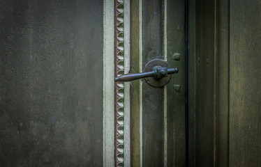The old vintage door handle and keyhole