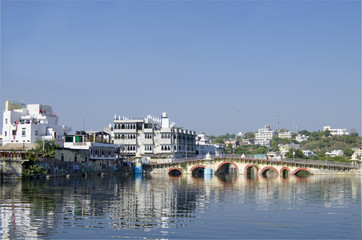 Fototapeta na wymiar Landscape the city of Udaipur in India on water, the city 