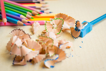 Wooden colorful pencils with sharpening shavings