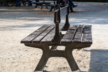Wooden bench at hiking trail for rest and taking break