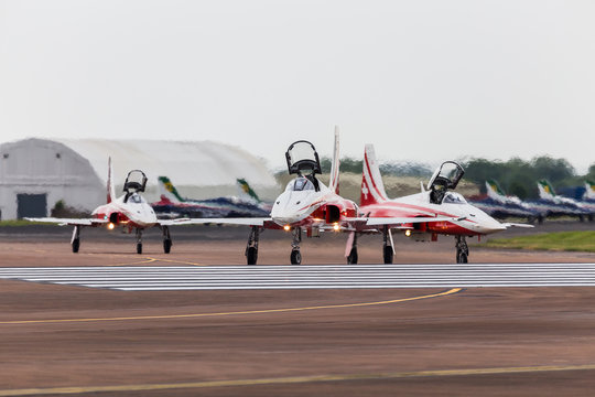 Close-up of Patrouille Suisse moving onto runway 27