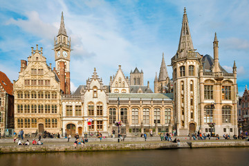 Fototapeta na wymiar GHENT, BELGIUM - JUNE 23, 2012: Typical old palaces from Graselei street from 16. - 18. cent. and west facade of Post palace.