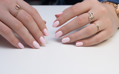 Hands and natural nails, ideal clean manicure. Decorated with stylish elements