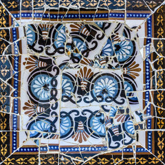 Broken glass mosaic tile, decoration in Park Guell, Barcelona, Spain