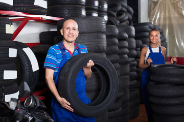 Mature technician man in coveralls
