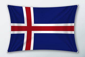 Iceland national flag. Symbol of the country on a stretched fabric with waves attached with pins. Realistic vector illustration.