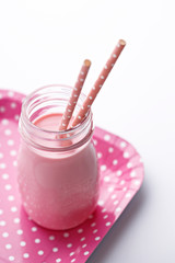 Berry shake in a jar on a serving tray