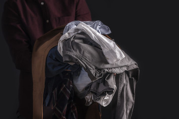 Man holding clothes