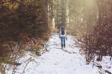 Woman walking in the woods