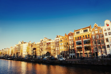Fototapeta na wymiar Beautiful night in Amsterdam, illumination of buildings and boat