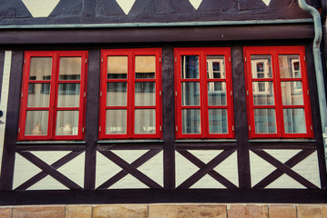 Facade of a building with windows. Charming town in Germany . Li