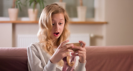 Internet shopping, teenager using smartphone