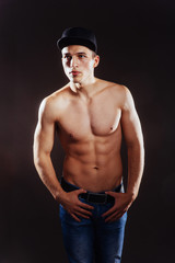 Obraz na płótnie Canvas Portrait of a fitness man with nude torso