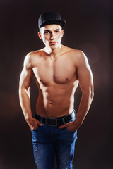 Portrait of a fitness man with nude torso