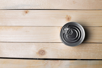 Fototapeta premium Tin cans for food on wooden background
