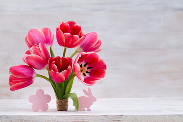 Pink tulips, spring flowers and Easter decoration.