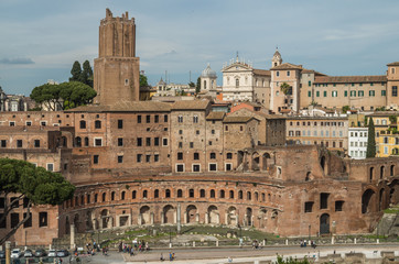 Fototapeta premium The Roman Forum is a plaza surrounded by many ruins of ancient government buildings in the center of Rome