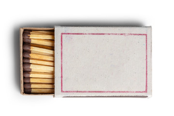 Matches isolated on white background. Closeup shot.
