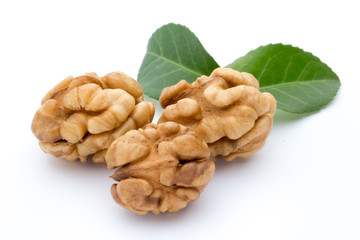 Walnut and walnut kernel isolated on the white background.