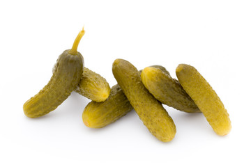 Marinated pickled cucumbers isolated on the white.