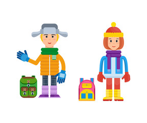 Boy and girl in winter clothing prepared for cold weather.