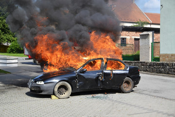 Car in fire, fireman  practice