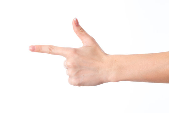 female hand showing the gesture with index finger and raised up the thumb is isolated on a white background