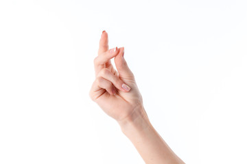 female hand showing the gesture with his fingers clasped isolated on white background