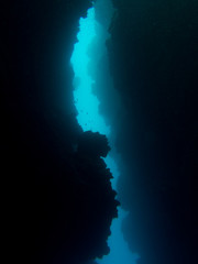 Slim underwater passage between rock formations
