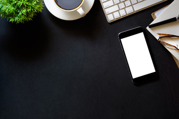 Modern dark surface office desk table with computer and cup of coffee. Hero Header Concept with...
