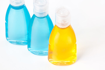 Cosmetics bottles mock ups with shower gel, body moisturizing lotion, herbal shampoo or massage oil isolated on white. Bathroom accessories wallpaper