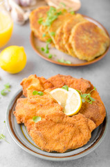 Delicious original schnitzel with potato pancakes