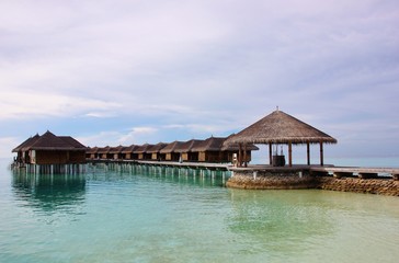 Wooden water villas in Maafushivaru atoll, Maldives