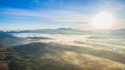 see fog in forest on hilltop inside the middle field of national park