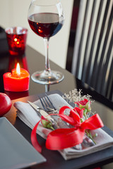 Table place setting with holidays decoration.