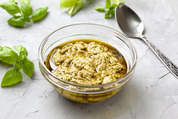 basil pesto in a glass bowl