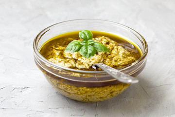 basil pesto in a glass bowl