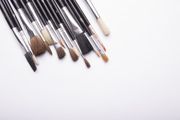 bunch of brushes on white background