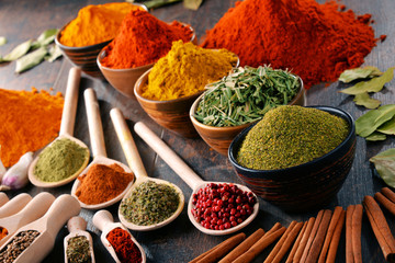 Variety of spices and herbs on kitchen table