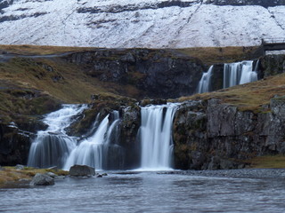 Stunning Kirkjufellsfoss Waterfall in the early winter, Snaefellsness Peninsula, Iceland 