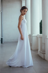 Fototapeta premium Beautiful woman posing long dress in Livadia