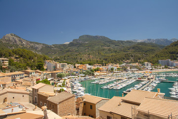 Obraz premium view of town rooftops and sea in summer mediterranean resort