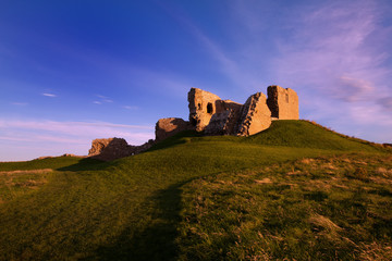 Duffus Castle, Elgin, Moray, Scotland is a ruined stone built motte and bailey fortress first constructed in the 12th century and finally abandoned in 1705.