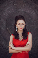 Young beautiful stylish girl walking and posing in city. Outdoor summer portrait of young classy woman