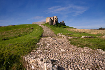 Duffus Castle, Elgin, Moray, Scotland is a ruined stone built motte and bailey fortress first constructed in the 12th century and finally abandoned in 1705.
