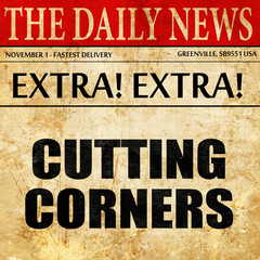 Obraz premium cutting corners, article text in newspaper