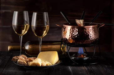 Fotobehang Swiss  cheese fondue on rustic background © Rozmarina